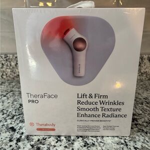 Therabody TheraFace PRO - Sleek White and Red